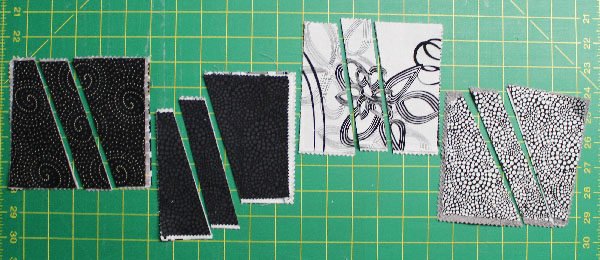 I picked two contrasting squares and cut them up to sew tham back together, making two rectangles.